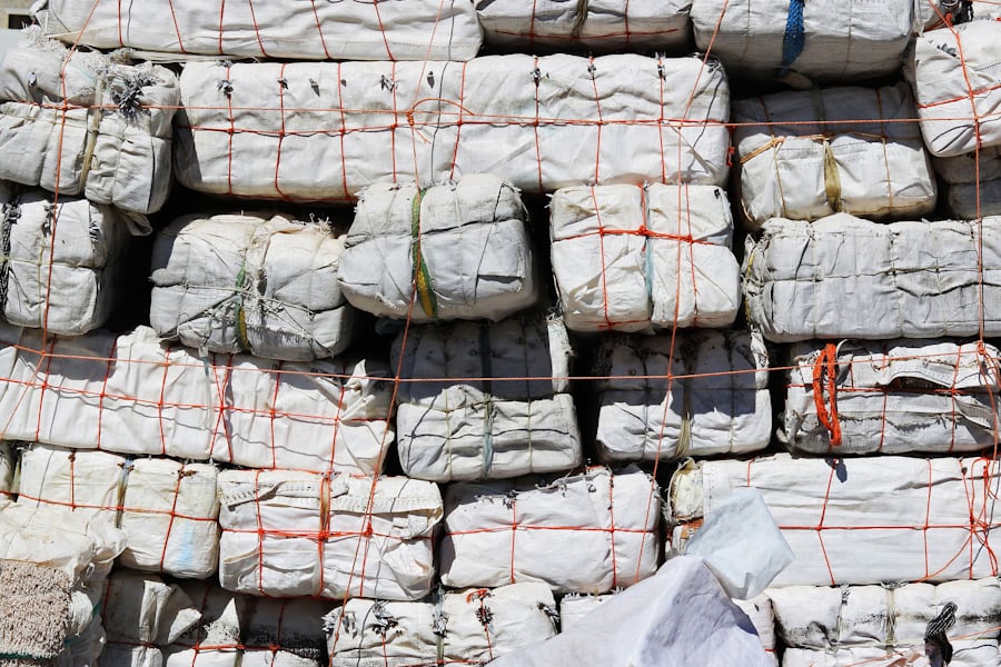 Building materials including cement, sand, blocks, and steel available through Leivant Marketplace